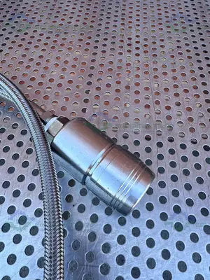 USED 66" STAINLESS STEEL FLEXIBLE BRAIDED HOSE W/ QUICK CONNECTIONS