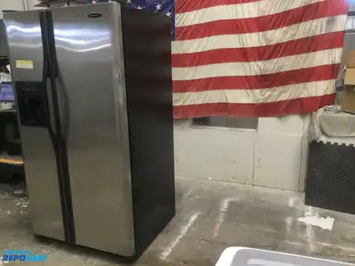 USED FRIGIDAIRE STAINLESS STEEL AND BLACK SIDE BY  SIDE REFRIDGERATOR HIGH EFFICANCY ENERGY STAR