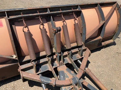 Boss 8’ straight blade snowplow, poly face, bolted on metal cutting edge. Spring trip, hydraulic ang...