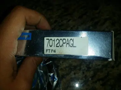 USED KOYO 7012C