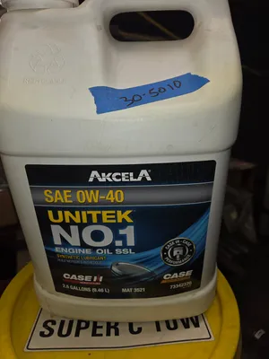 Case HY-Tran Hydraulic transmission oil. Case sae 0w-40 oil, Super C 10w oil. All new
