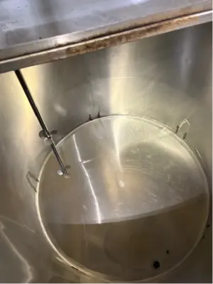 1775 Gallon Stainless Steel tank W/ Mixer for sale