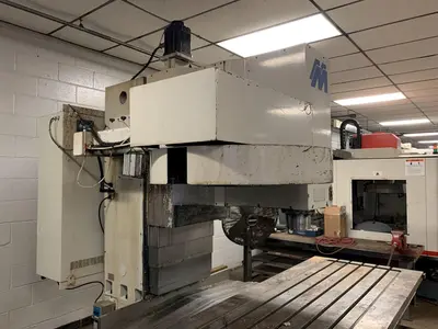 MILLTRONICS RH-33 CNC VERTICAL MACHINING CENTER