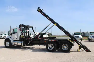 New | in-Stock 2027 PETERBILT 548 Rolloff Trucks Texas US | Roll Off Truck World #1492019