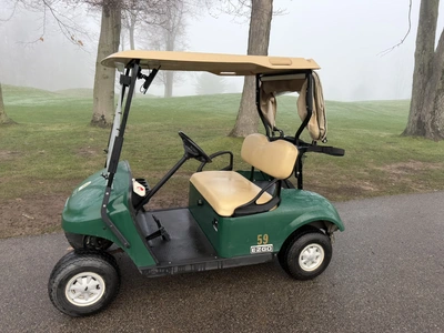 (1) 2017 E-Z-Go golf cart with a Kawasaki gas engine, model 625111G01, includes canopy, ball cover, ...
