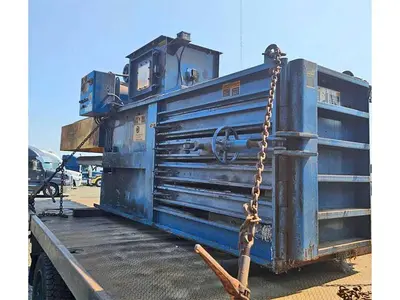 Selco Closed Door Baler with Conveyor