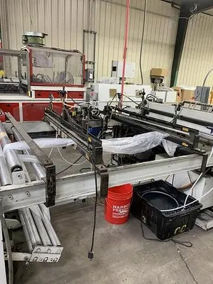 USED FMC SPLIT ROLL SIDEWELD MACHINE