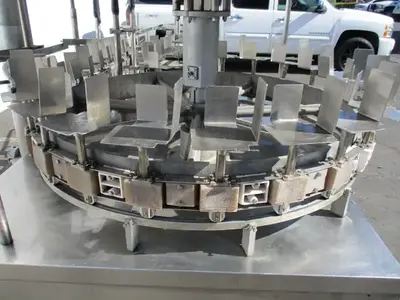 Gravity feed, 1 gallon bottle filling machine w/ 24 heads