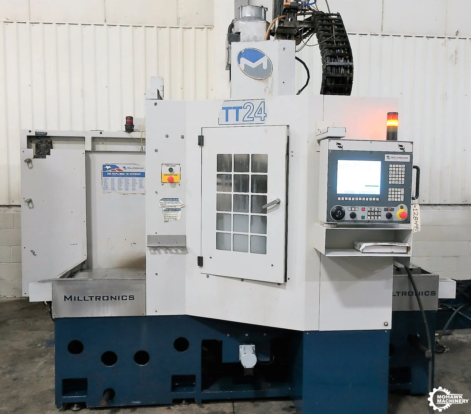 TT-24 MILLTRONICS 3-AXIS TWIN-TABLE BRIDGE TYPE CNC VERTICAL MACHINING CENTER w/(2) 24” X 24” TABLES - 24-POSITION AUTOMATIC TOOL CHANGER - RIGID TAPPING