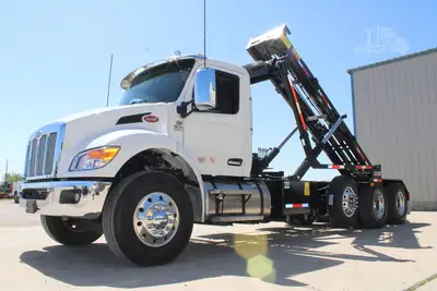 New | in-Stock 2027 PETERBILT 548 Rolloff Trucks Texas US | Roll Off Truck World #1492012