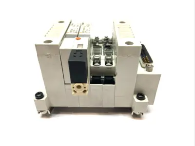 USED SMC PLUG-IN MANIFOLD BASE 4-STATION