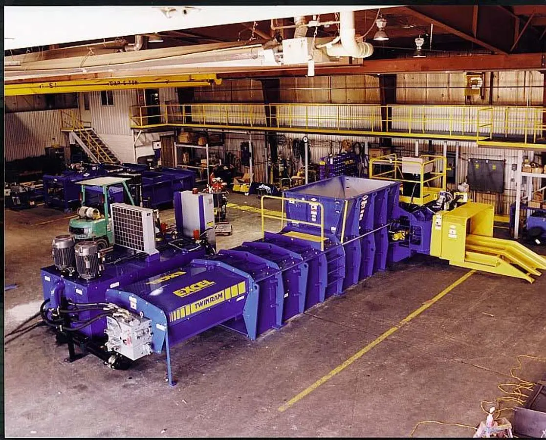 USED EXCEL SIGNATURE 150 SERIES TWO-RAM BALER