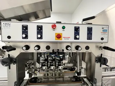 USED ACASI 6  SPINDLE  CAPPER