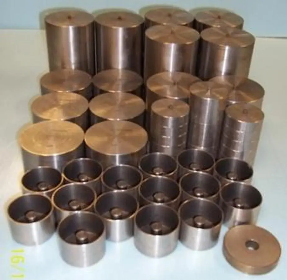 QTY. 1. LOT WEIGHTS WITH NIPPLE ON TOP AND HOLE IN...