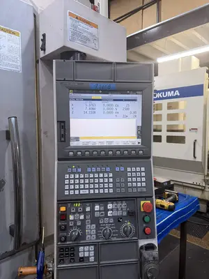 USED 2011 OKUMA GENOS 560V