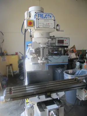 Frejoth (Bridgeport copy) milling machine w/ digital read out feed, 9" x42"table, 3 HP, R8 taper, 220V / 440V, impeccable