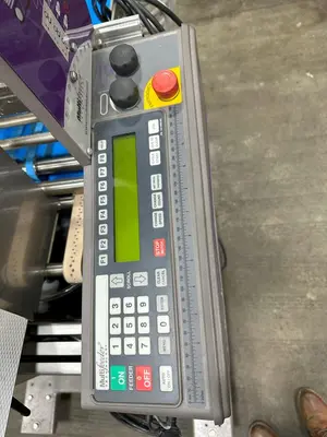 USED MFT 550 IP³ FEEDER AND LABELING SYSTEM