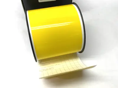 USED LABELTAC PRO MODEL HIGH PERF. VINYL LABEL, YELLOW, 4" OPEN, SOME USED
