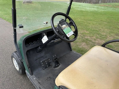 (1) 2015 E-Z-Go golf cart with a Kawasaki gas engine, does not include Club canopy, includes ball wa...
