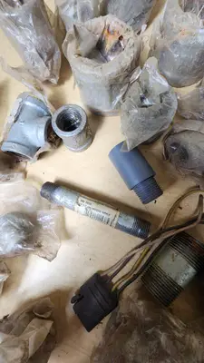 Lot of Plumbing Hardware and Fittings including Galvanized Nipples, Elbows, Valves, and Connectors