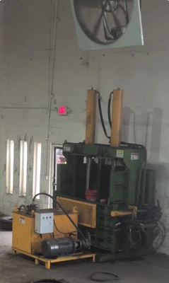 Dual Piston vertical baler for light metals, tires, cardboard, plastic, & others
