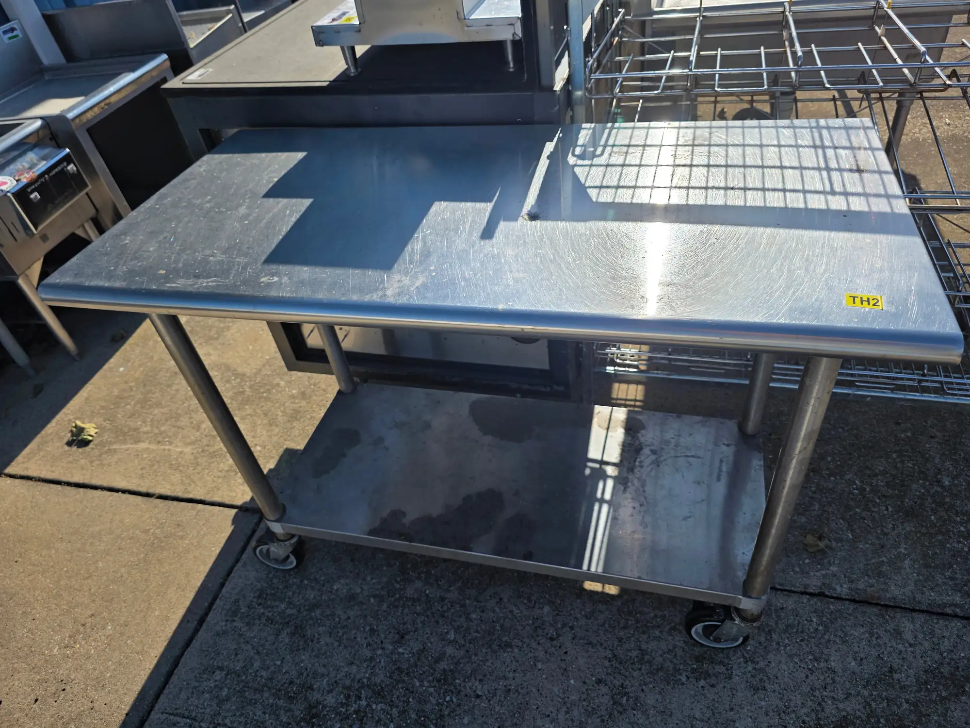 Used Falcon Restaurant Supply, Inc. Used 48"X 24" Stainless Steel Table with Casters - TH2 - SS378 Food Prep Tables Illinois US | Falcon Restaurant Supply #1373726