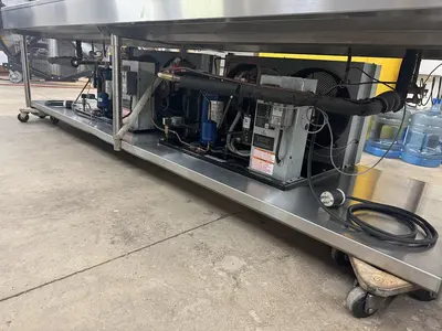 USED 2016 LESLIE FISHER ENGINEERING INC. STAINLESS STEEL CHILLER TABLE