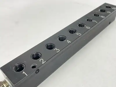 USED POLYCONN PNEUMATIC MANIFOLD 10X 1/4" NPT OUT 3/8"NPT IN