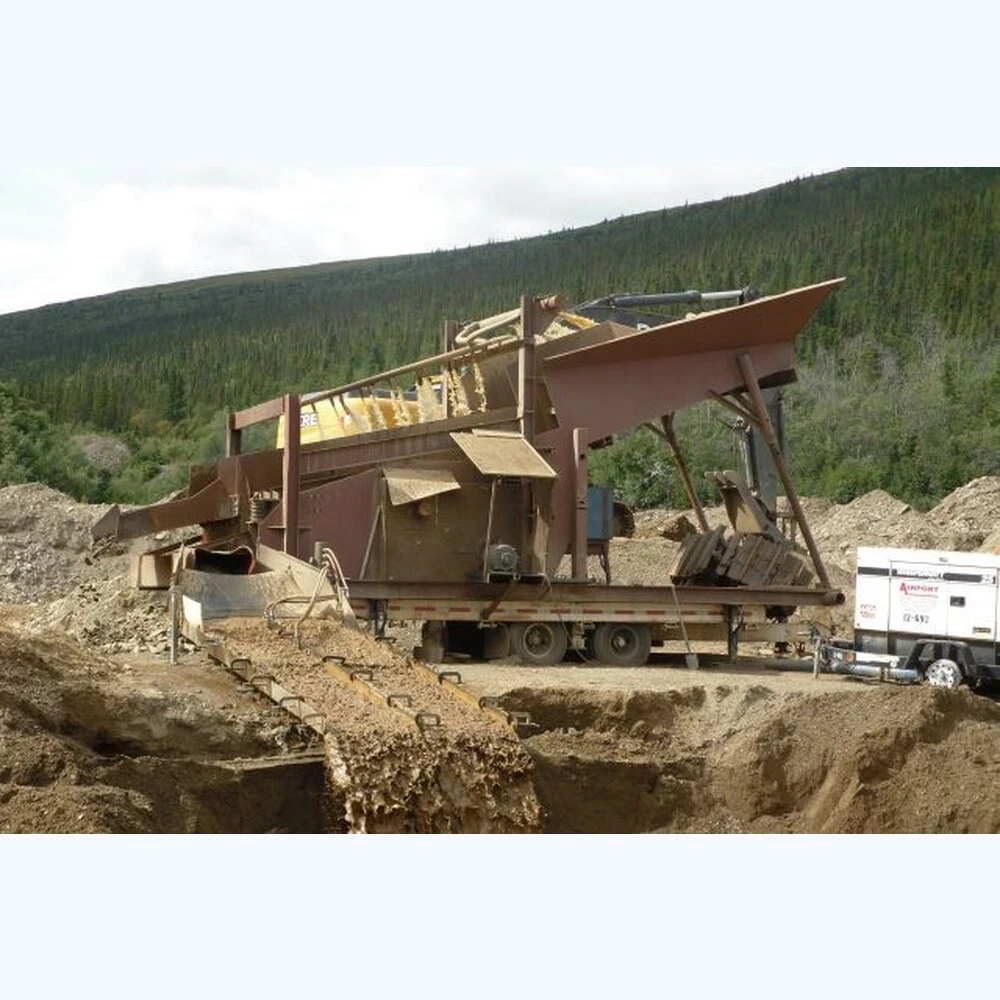 5 ft. Wide x 14 ft. Long wash plant Mounted on Tandem Axle Trailer. Complete With Sluice Box.