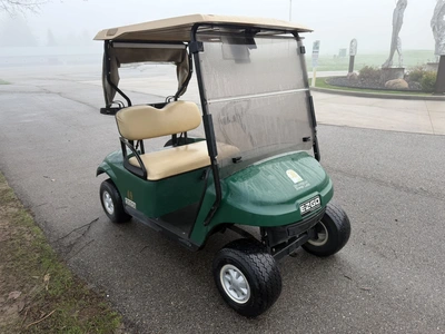 (1) 2017 E-Z-Go golf cart with a Kawasaki gas engine, model 625111G01, includes canopy, ball cover, ...