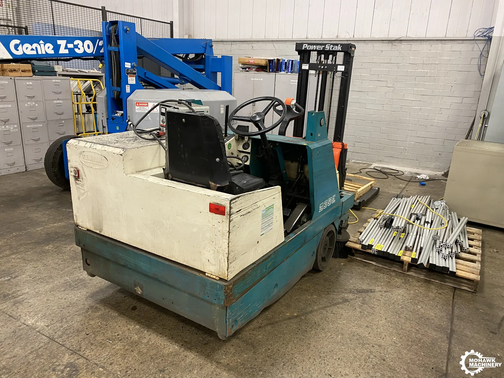 48” TENNANT “235EV” 36-VOLT ELECTRIC FLOOR SWEEPER w/10 CU FT HYDRAULIC TILTING HOPPER - CHARGER