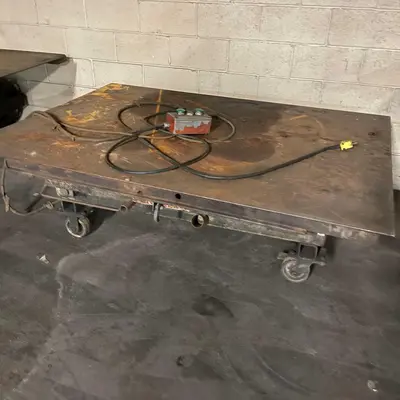2,000 LB X 48" X 68" ROLLING LIFT TABLE. STOCK # 0958621
