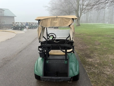 (1) 2015 E-Z-Go golf cart with a Kawasaki gas engine, includes canopy, ball cover, club cover, fold-...