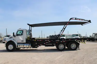 New | in-Stock 2027 PETERBILT 548 Rolloff Trucks Texas US | Roll Off Truck World #1492019