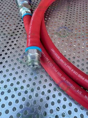 USED SWAGELOK PUSH ON 124" FLAME RESISTANT HOSE 3/4” 300PSIG W/ QUICK RELEASE FITTING