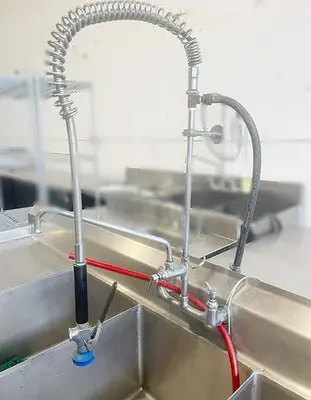 Triple pot sink with drain boards and spay faucet and add on taps