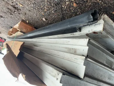 Used 8’ Tall x 10’ Wide Insulated Roll Up Door, comes with tracks, spring, and hardware, four panels...