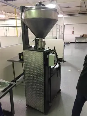 Kalix model KX67B 16-Station Tube filler and sealer