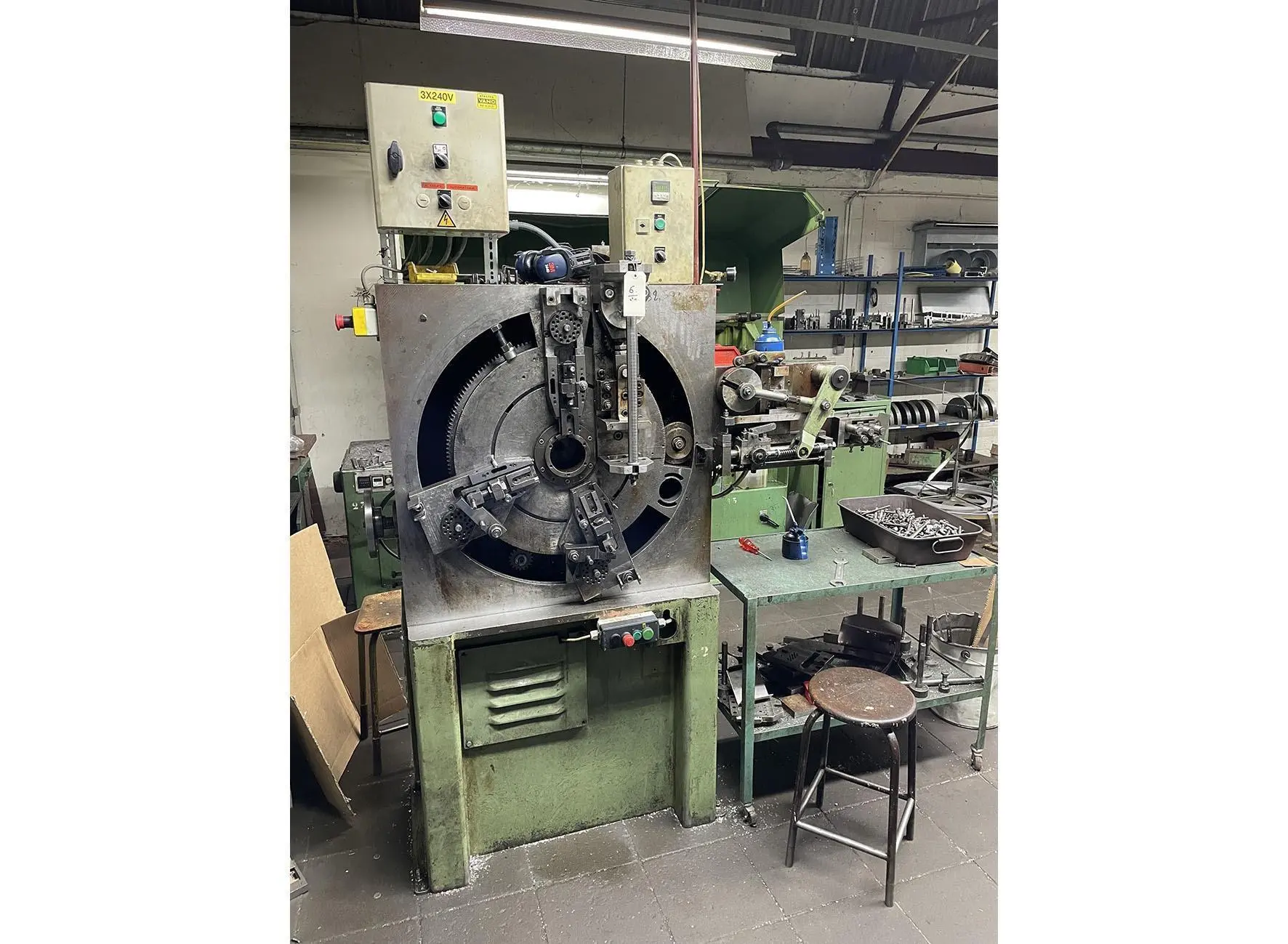 USED BUCH DCM-200 4/40 SPRING MAKING