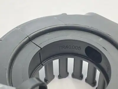 USED IGUS TRIFLEX R STANDARD MOUNTING BRACKET W/ STRAIN RELIEF 70MM DIA.