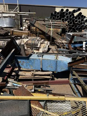 Air conveying scrap system with 100's of feet of piping