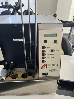 USED MEDICAL PACKAGING INC. FLUIDOSE III
