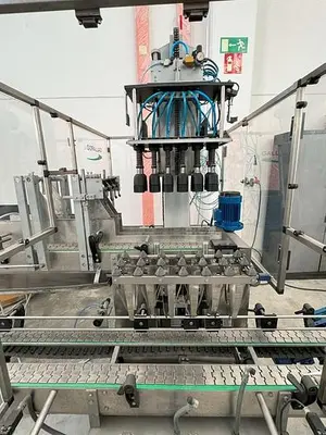 PACKING MACHINE FOR GLASS BOTTLES
