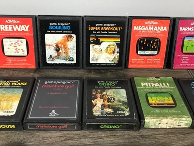19 - Atari Video Games & 2 Paddle Controllers - see description for more info