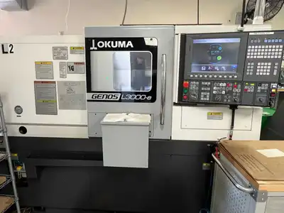 2021 OKUMA GENOS L3000-E Lathes, Bar, CNC | Machnet (1)