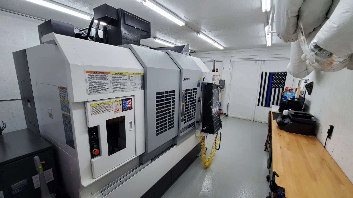 OKUMA GENOS M560-V with ATS RT-160 4th Axis Rotary Table