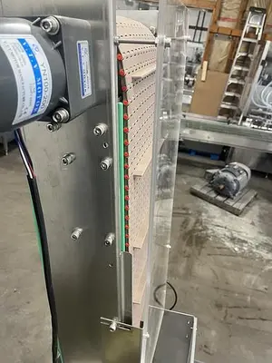 Automatic Cap Elevator