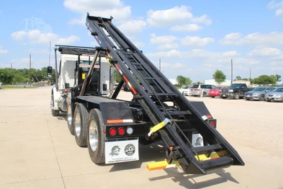 New | in-Stock 2027 PETERBILT 548 Rolloff Trucks Texas US | Roll Off Truck World #1492013