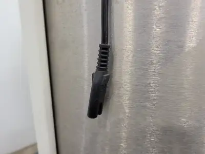 Quantum Mechanical Axial Magnetic Shield