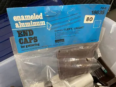 Collection of Enameled Aluminum Gutter End Caps and Fittings